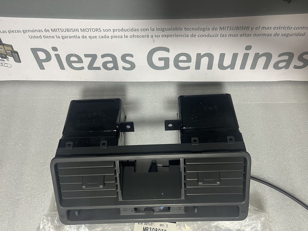 [MR308038] - MITSUBISHI | DIFUSOR CENTRAL AIRE PANEL INSTRUMENTOS