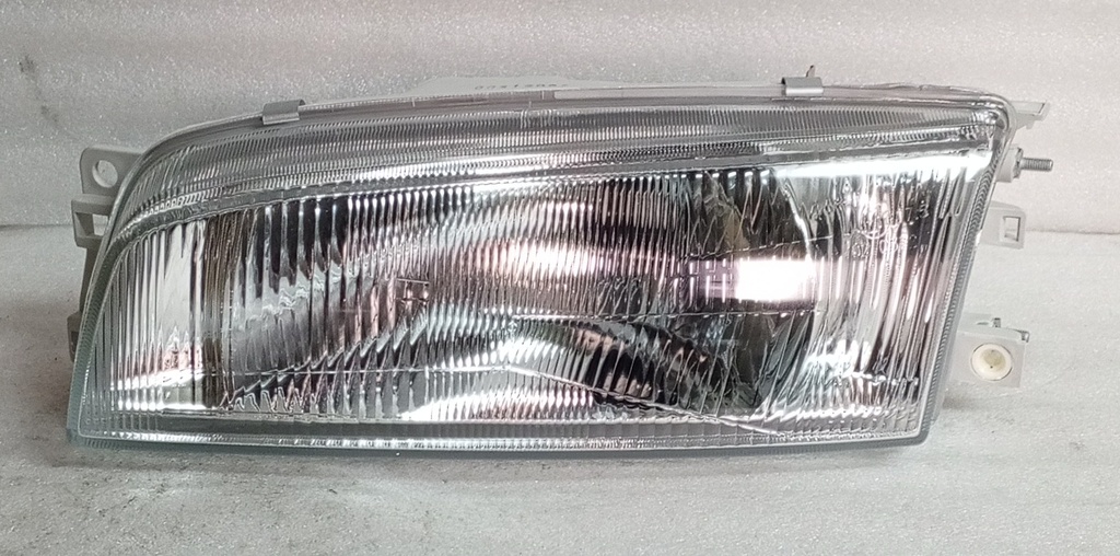 [MR273419  MR275291]- DEPO - FAROLA MITSUBISHI LANCER CK 96-98 IZQUIERDA  (CAPOT CON PESTAÑA)