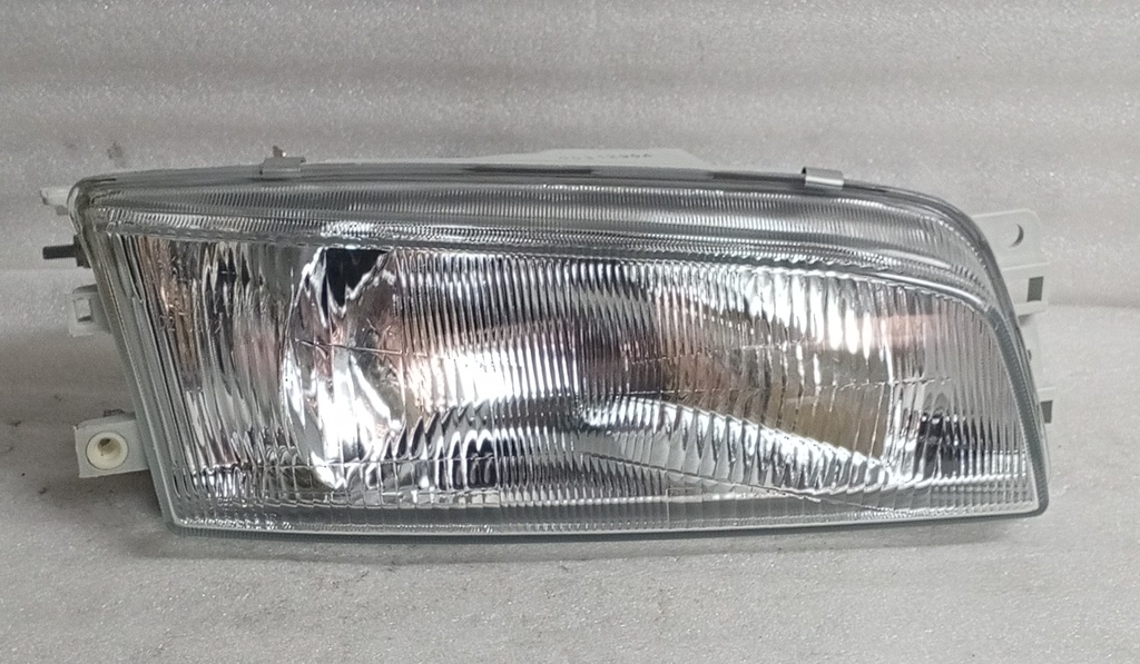 [MR273420-MR275292]- DEPO - FAROLA MITSUBISHI LANCER CK 96-98 DERECHA (CAPOT CON PESTAÑA) 