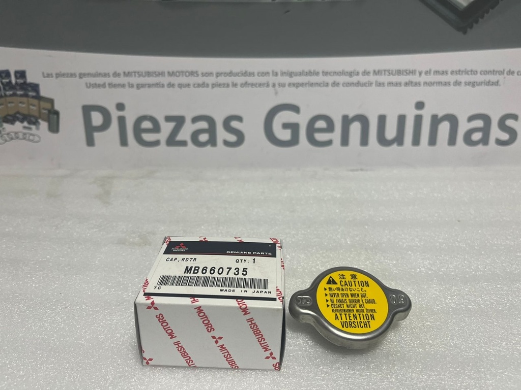 [MB660735] - MITSUBISHI | TAPA RADIADOR MEDIANA (MONTERO,L-300 etc.) (NORMAL)